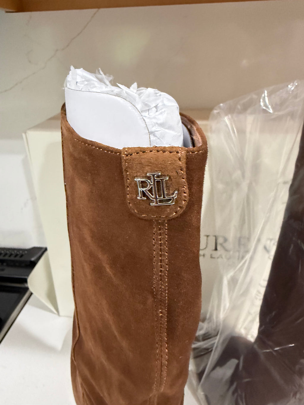 Brown Kid Suede Knee High Boots for Women by Lauren Ralph Lauren Artizan II, size 9B, shown from the side view.